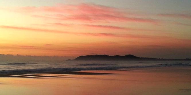 Stunning sunrise view of Cape Byron from Tyagarah Beach. Photo: Yuti McLean.