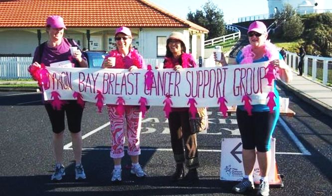 Barb Pinter and the Byron Bay Breast Cancer Support Group at the top of the lighthouse run shining bright. Photo supplied.