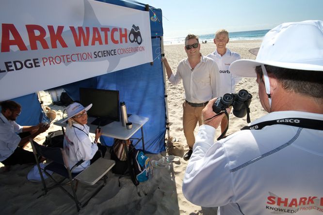The launch of Shark Watch in Byron Bay. Jan Gilbert, sitting, and Andrew Nieuwenhof of Shark Watch NSW, with Mayor Simon Richardson at today’s launch at Tallow beach. Photo: Jeff Dawson.
